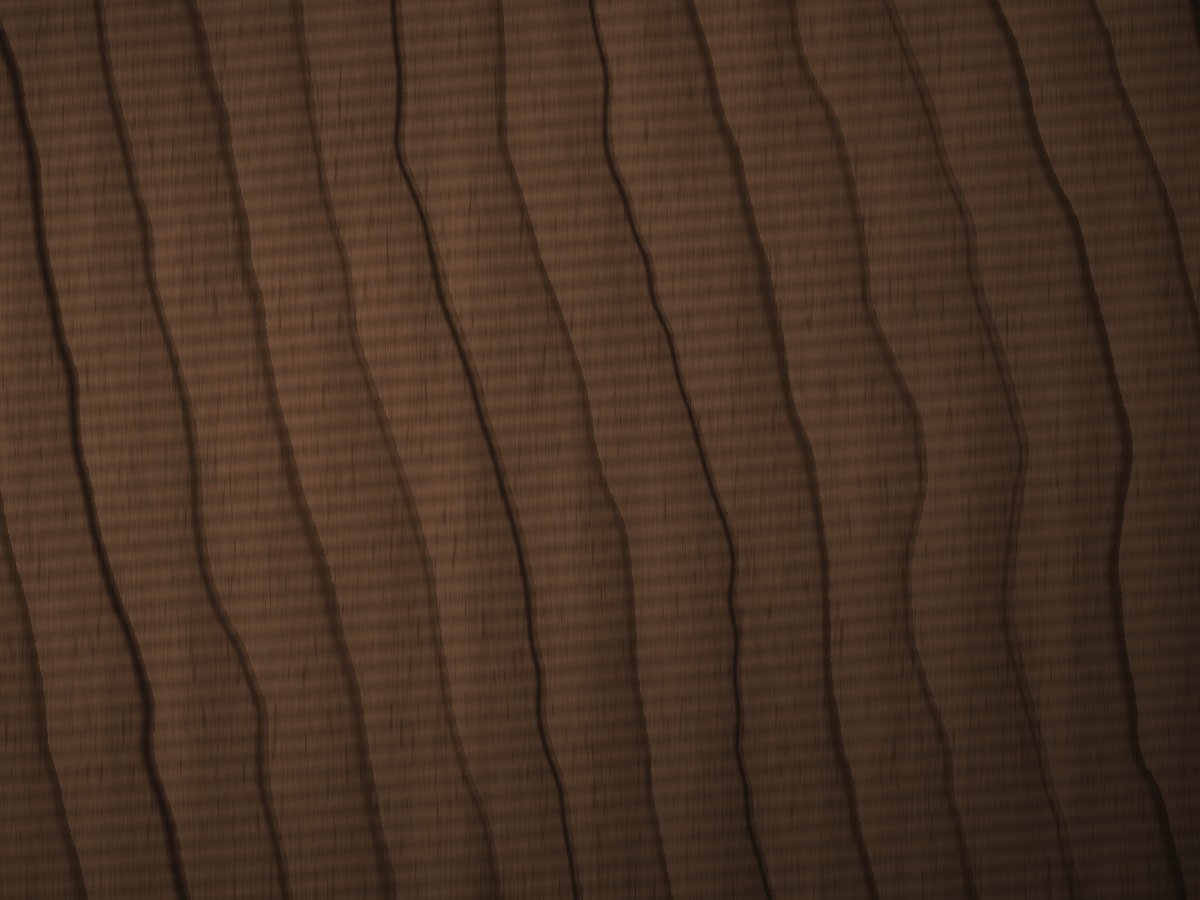 A walnut top under low workshop light